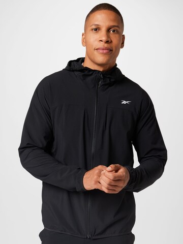 Reebok - Chaqueta deportiva 'DMX Woven' en negro: frente