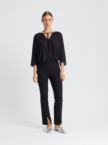 Minx Bluse‌‌‌‌‌‌‌‌‌ in Schwarz