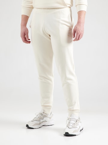 balta PUMA Siaurėjantis Sportinės kelnės 'ESS': priekis