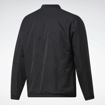 Reebok Sportjacke in Schwarz