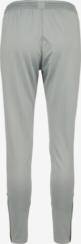 NIKE Slim fit Workout Pants in Grey