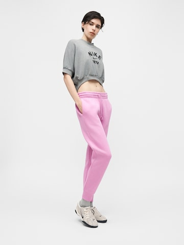 Nike Sportswear Tapered Hose 'Phoenix Fleece' in Pink
