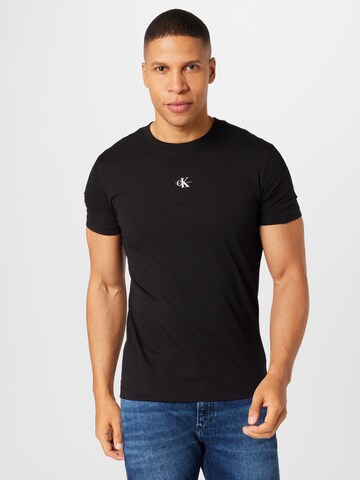 T-Shirt Calvin Klein Jeans en noir : devant