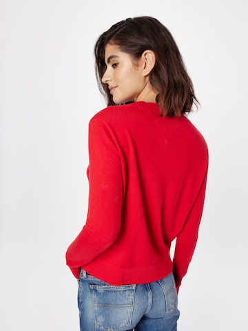 Pull-over Tommy Jeans en rouge