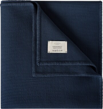 Cradle Studio Blankets in Blue: front