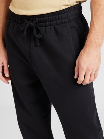 Tapered Pantaloni de la TOPMAN pe negru