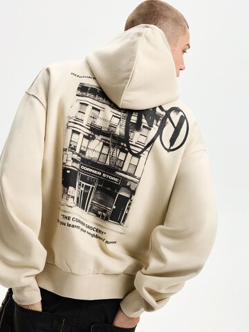 Sweat-shirt Bershka en beige : devant