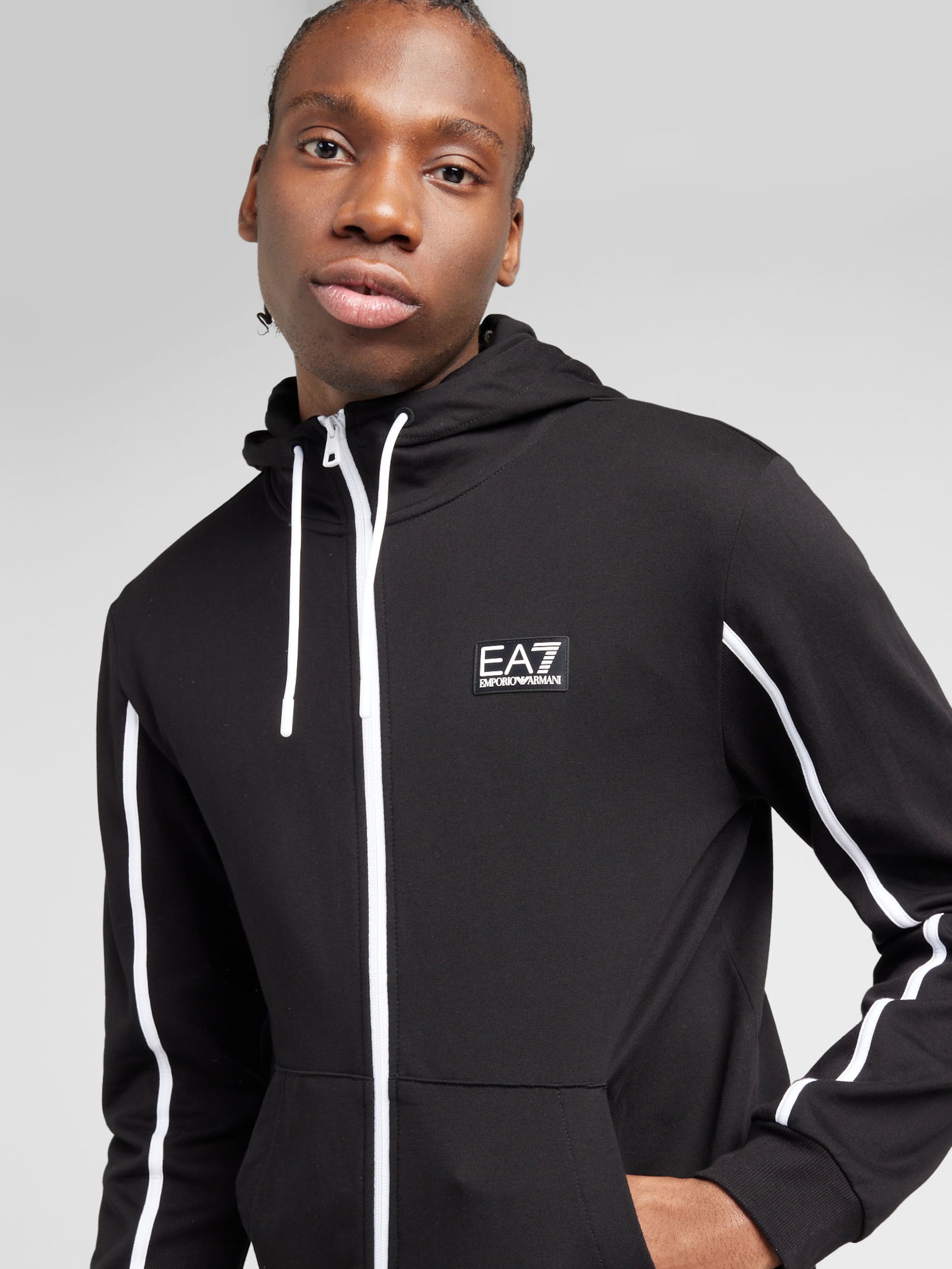 EA7 Emporio Armani Sweat jacket in Black ABOUT YOU