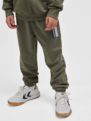 Effilé Pantalon 'TUKAS' Hummel en vert