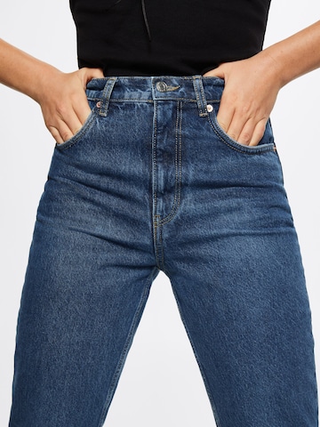 MANGO Tapered Jeans i blå