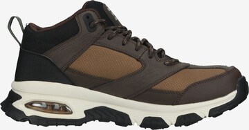 SKECHERS Boots in Brown