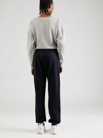 NAPAPIJRI Tapered Trousers 'M-IAATO' in Black