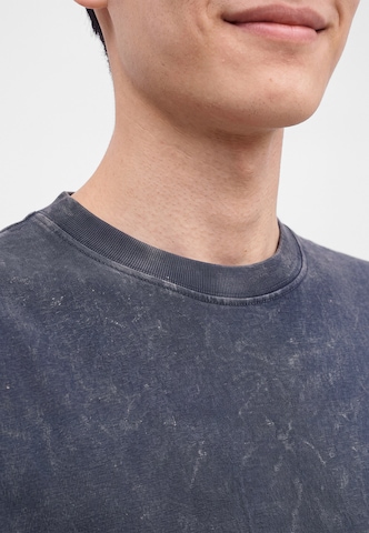 Tricou 'Lambert' de la Carhartt WIP pe albastru