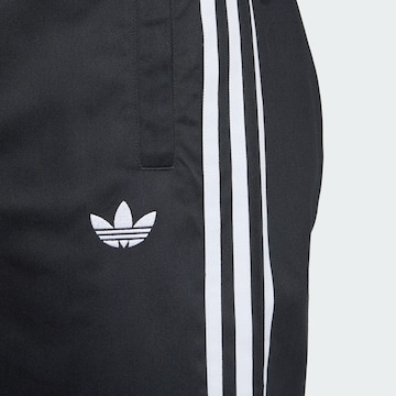 ADIDAS ORIGINALS Loose fit Trousers 'Adicolor' in Black