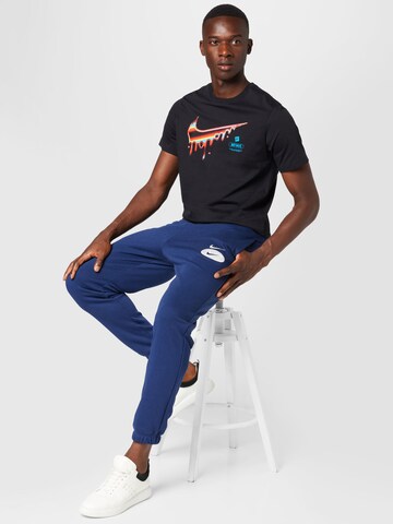 Nike Sportswear Tapered Trousers in Blue