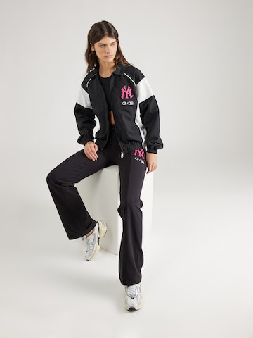 Champion Authentic Athletic Apparel - Chaqueta de entretiempo en negro