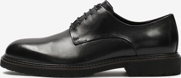 Kazar Lace-Up Shoes in Black: front