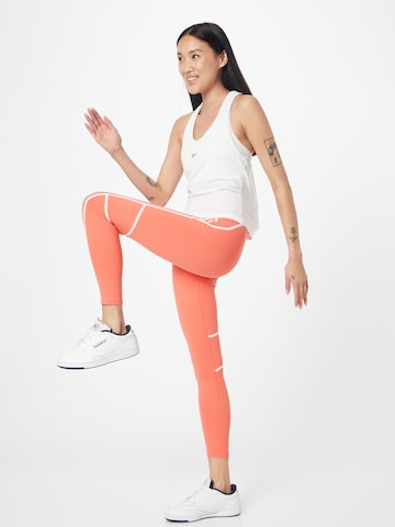 Reebok Skinny Sportovní kalhoty – oranžová