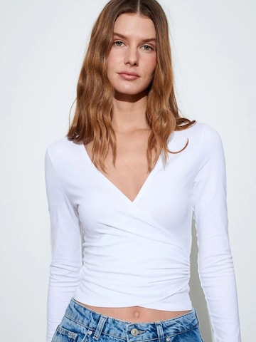 Maglietta di Dilvin in bianco