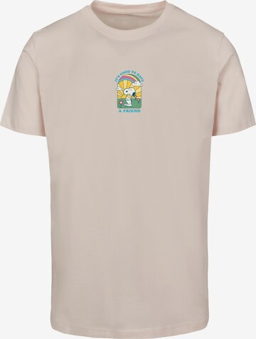T-Shirt 'Peanuts - It's Good To Have A Friend' Merchcode en rose : devant