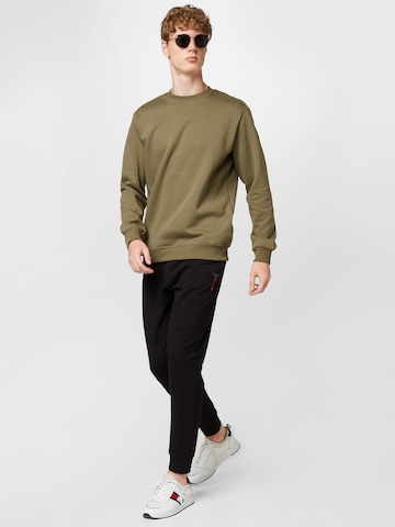 ABOUT YOU Sweatshirt 'Curt' in Green