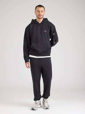 ALPHA INDUSTRIES Bluzka sportowa 'DTM' w kolorze czarny