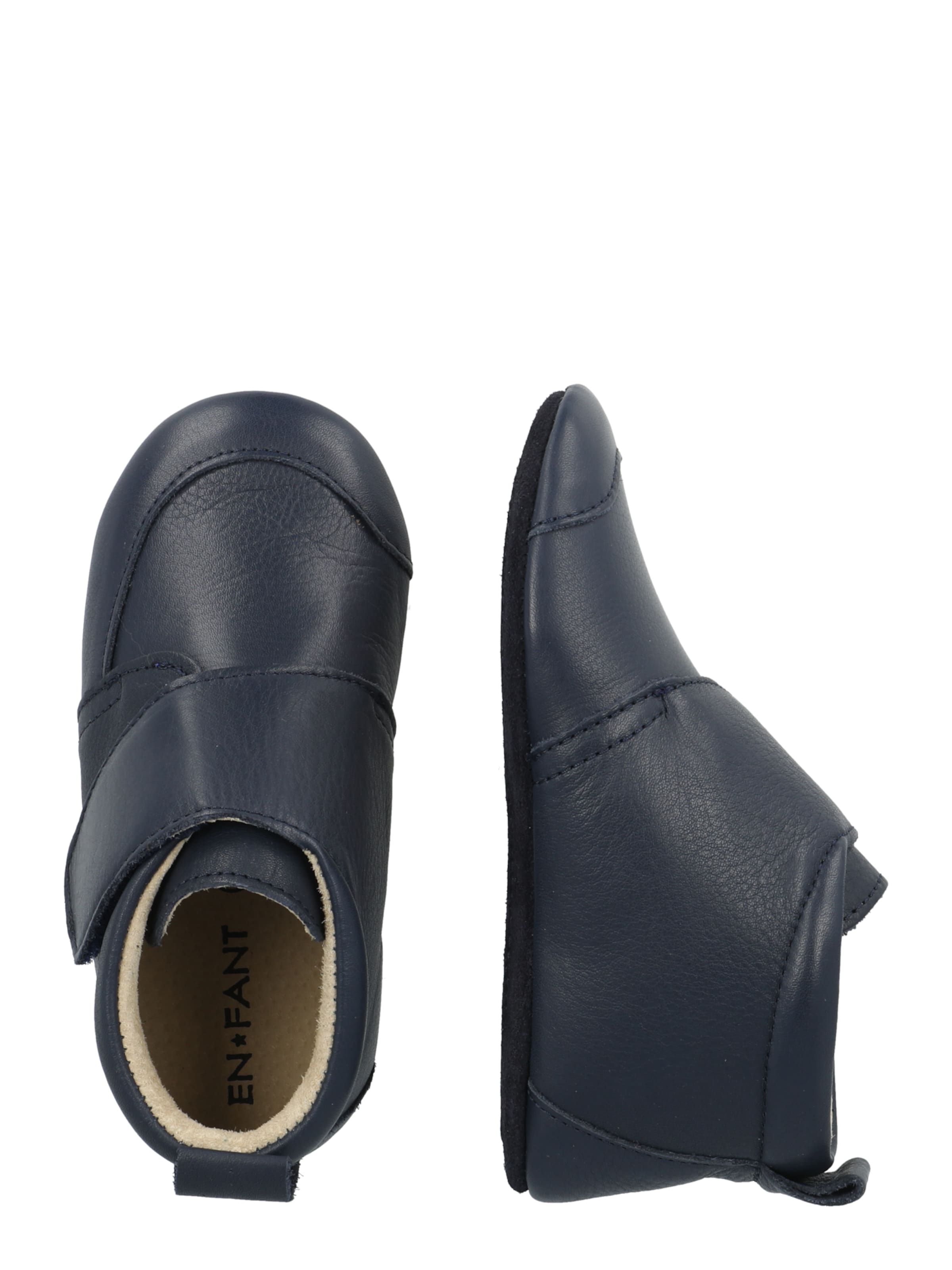 EN FANT Lära-gå-sko i blå