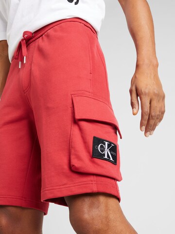 Calvin Klein Jeans tavaline Klapptaskutega püksid, värv punane