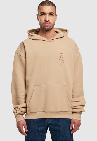 Merchcode Sweatshirt 'K Heart' in Beige: voorkant