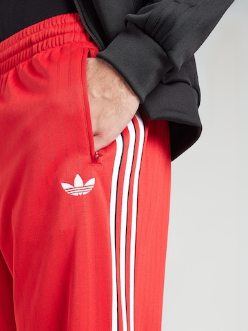 Regular Pantaloni 'FIREBIRD' de la ADIDAS ORIGINALS pe roșu