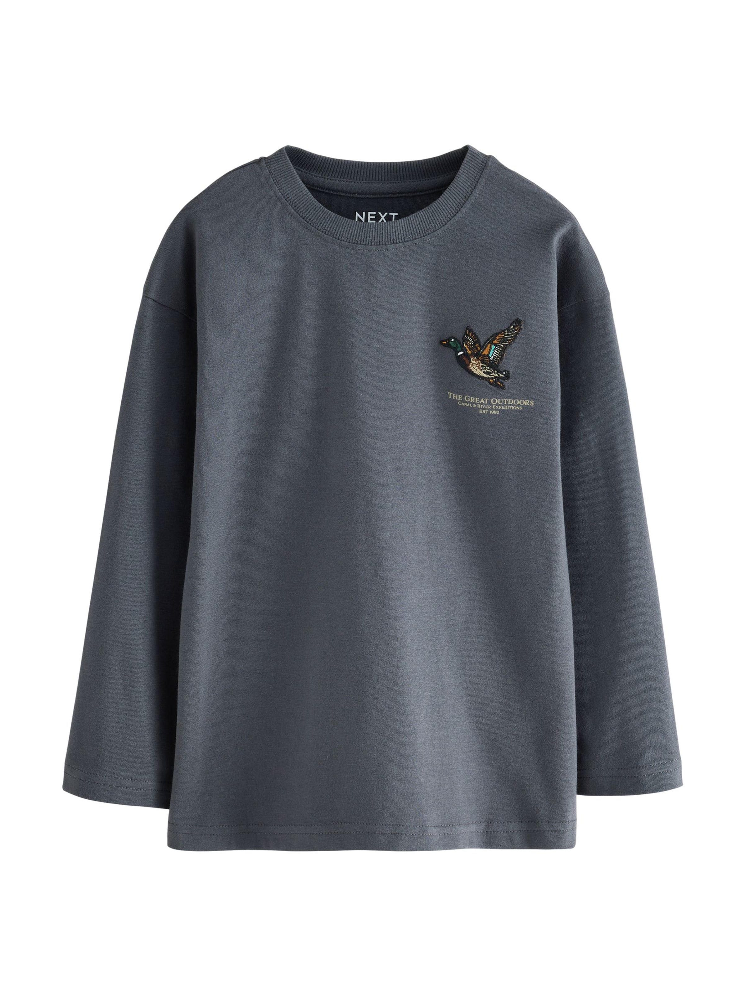 Next T-shirt i grå: framsida