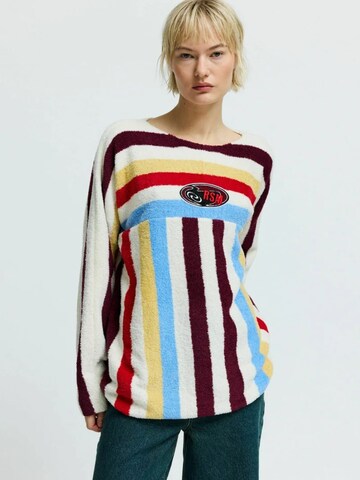 Résumé Neulepaita ' HenleyRS ' värissä monivärinen: etupuoli