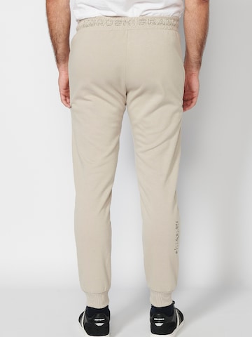 KOROSHI Tapered Trousers in Beige