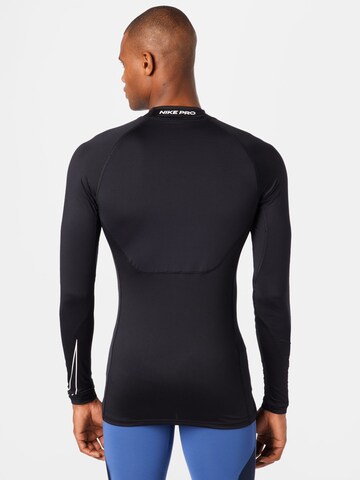 Maglia funzionale di NIKE in nero