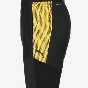 Effilé Pantalon de sport PUMA en noir