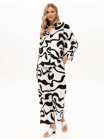 Passioni Pantsuit 'Zweiteiliges Set mit Oversized Bluse' in Black: front