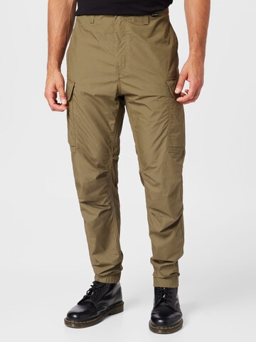 Effilé Pantalon cargo G-Star RAW en vert : devant