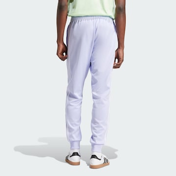 Tapered Pantaloni 'Adicolor Classics' di ADIDAS ORIGINALS in lilla