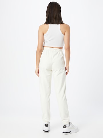 Athlecia Tapered Sports trousers in White