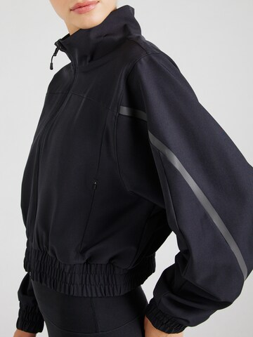 Veste de sport 'Unstoppable' UNDER ARMOUR en noir