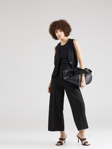 ABOUT YOU x Iconic by Tatiana Kucharova Wide leg Trousers with creases 'Vicky' in Black