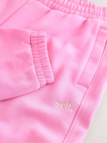 self. Tapered Functionele broek in Roze