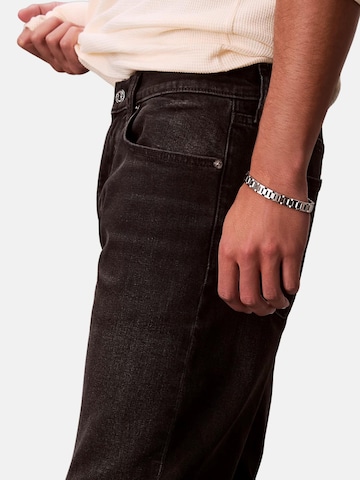 Calvin Klein Tapered Jeans 'CALVIN KLEIN CLASSIC TAPER AVERY PANTALONE' i svart