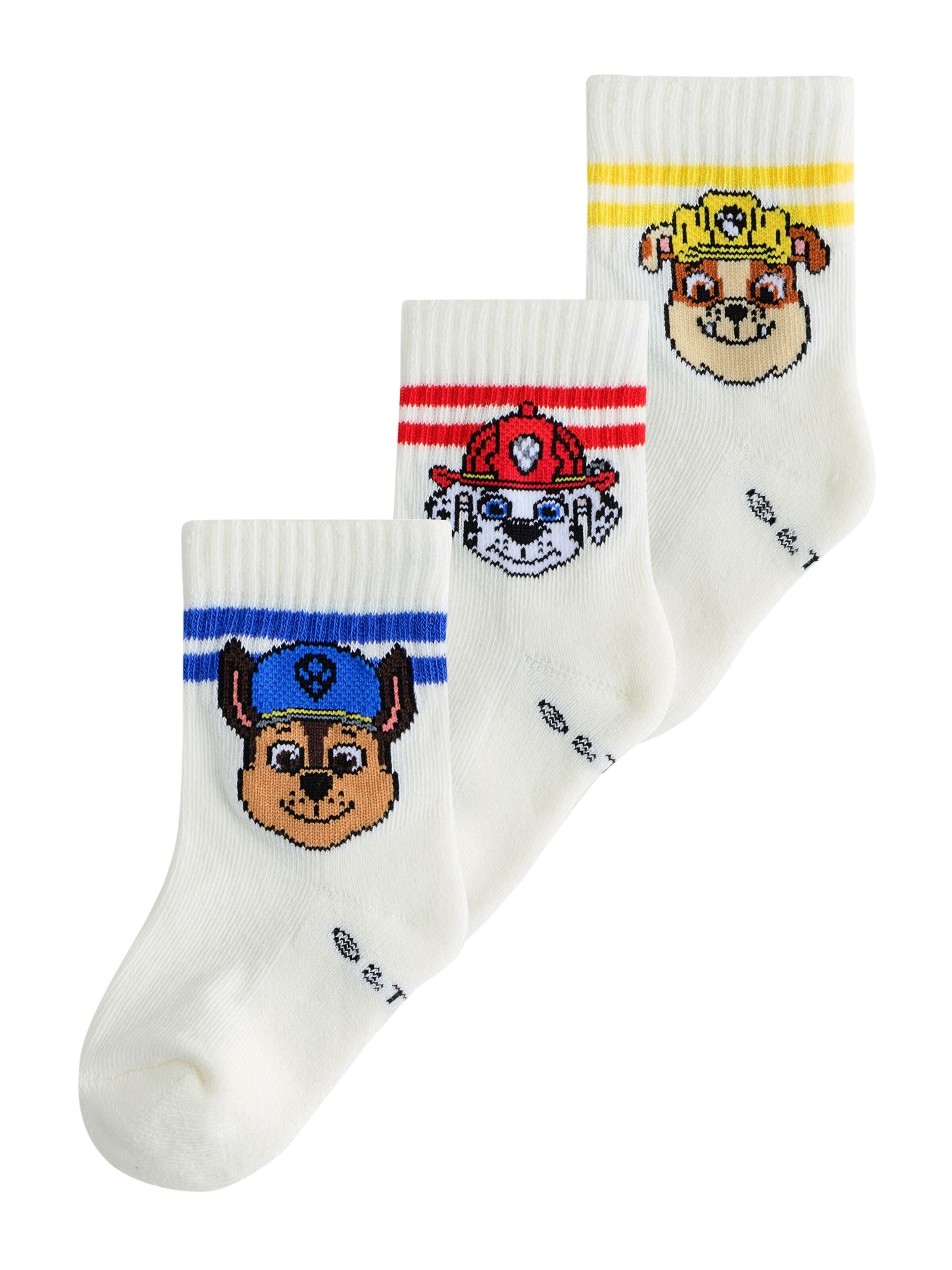 Next Sockor i vit: framsida