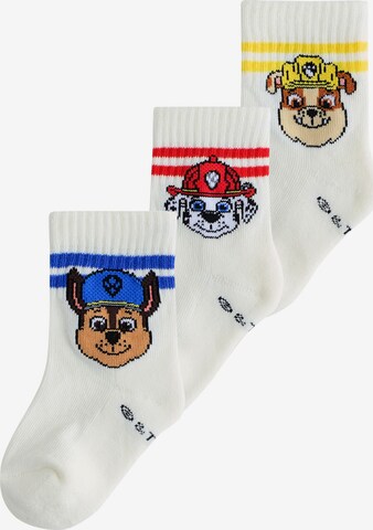 Next Sockor i vit: framsida