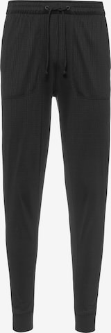 Tapered Pantaloni sport de la NIKE pe negru: față