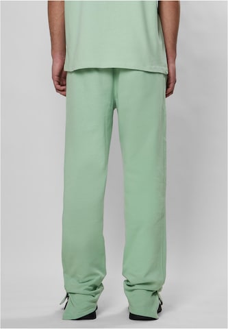 Regular Pantaloni 'Sense' de la 9N1M SENSE pe verde