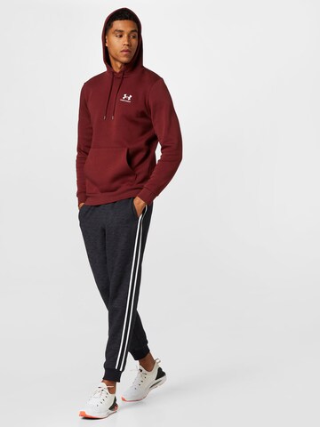 UNDER ARMOUR Sportsweatshirt 'Essential' in Rood
