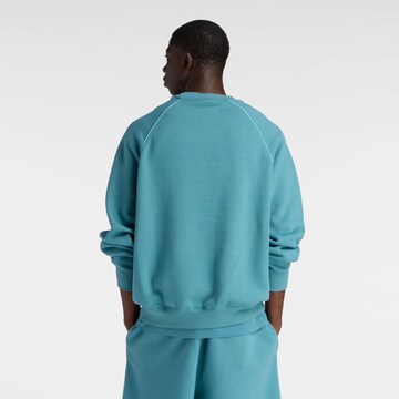 Sweat-shirt 'Trackside' new balance en bleu