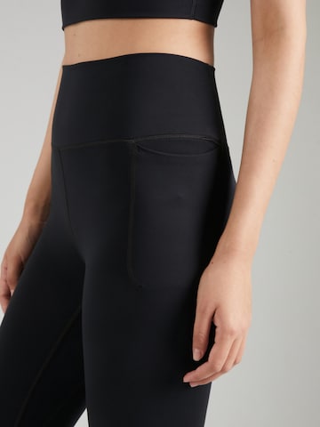 UNDER ARMOUR Skinny Sportbroek 'Meridian' in Zwart